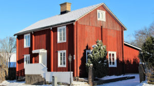 Bilde av rødt gammelt hus
